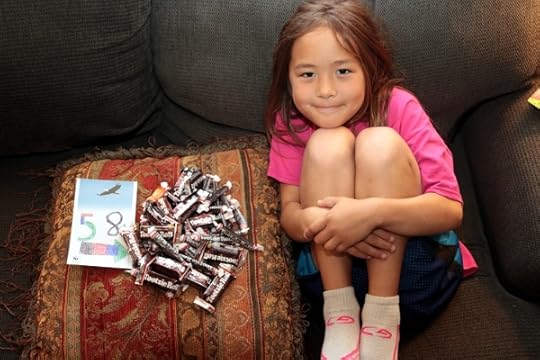SteelyKid wants you to know she got 58 pieces of candy at the softball party.