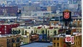 A Salvation Army tower stands in a city skyline (Flicker/swanksalot/Creative Commons).