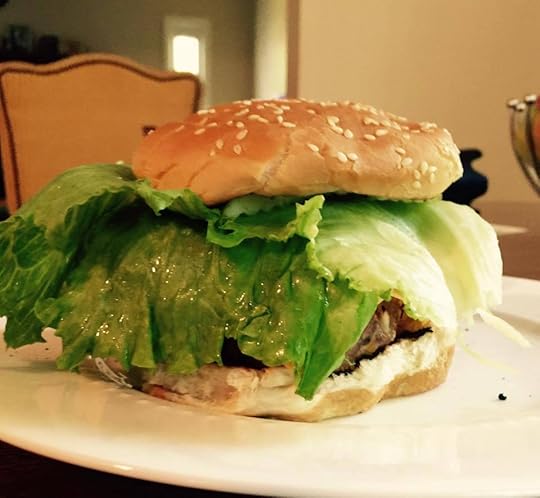 The towering goodness of a self-made hamburger.