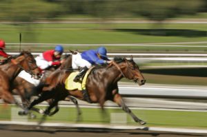 Horse race shot a slow shutter speed to enhance motion effect
