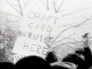 Draft_card_burning_NYC_1967