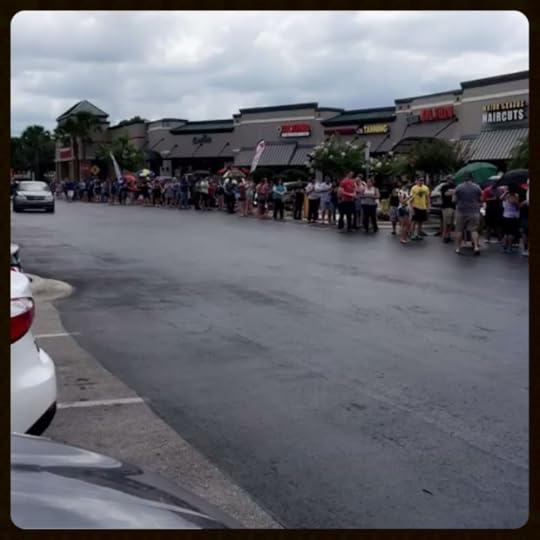 [Long lines of people donating blood (no gay men if they've had sex w/in 12 months)]