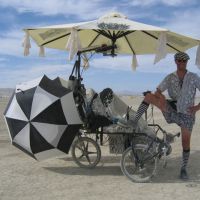 The three umbrellas on the Zander Lander are driven by three independent electric motors, which add to the tricycle’s unique visual. (Image courtesy of Paul Norton via leozander.blogspot.com)