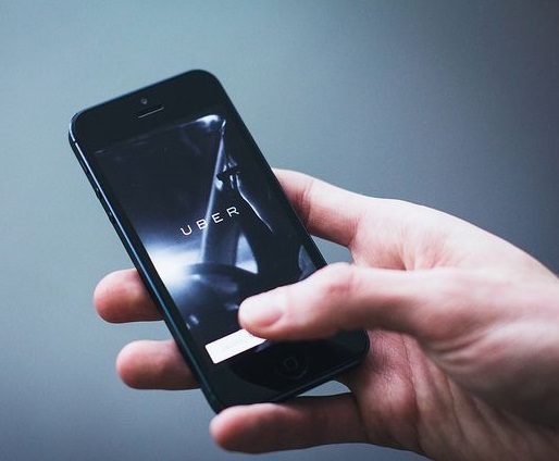 Uber app. Photo by freestocks.org. Public domain via Flickr.