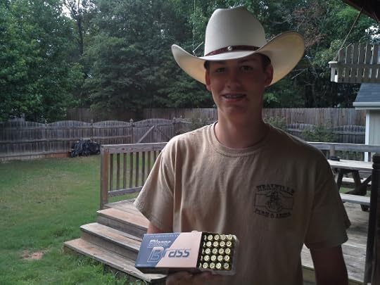 Robert and the box of bullets that were his Father's Day gift to himself that he arranged to not have to pay for.