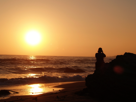 Sunset and fellow photographer at the beach