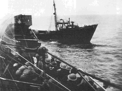 HMS Tartar's boarding party prepares to board German weather ship Lauenburg, 28 June 1941 (Imperial War Museum)
