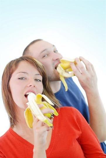 24872092 happy couple with bananas