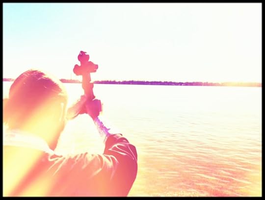 Father Matthew, blessing the Mississippi River on Theophany (Photo by Rod Dreher)