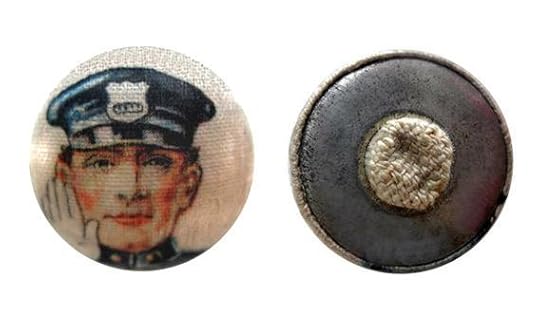 A fabric-printed garter button, used by flappers to hold up their newly-visible stockings.