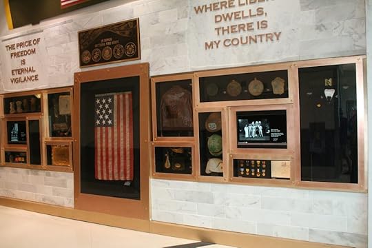 Wall display at Hartsfield-Jackson Atlanta Airport featuring VHP collections. Photo by David Vogt.