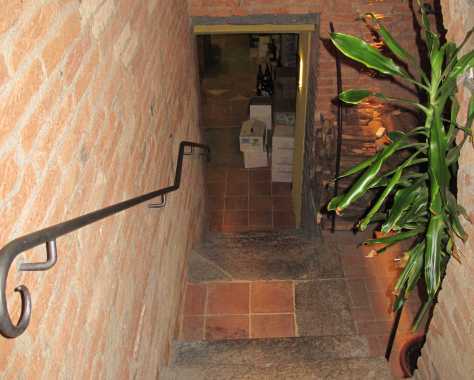 Stairs to one of the most intriguing restaurant wine cellars in Roero. 