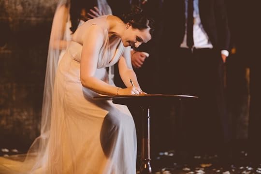 Briana witnesses the marriage contract. Photo by Abby Lorenz.