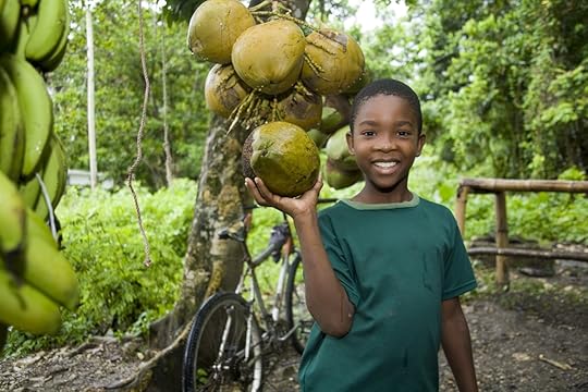 Boy-with-coconuts-credit-Jim-Smith