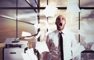 Man stressed yelling in office