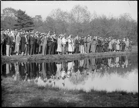Title: Crowd reflected in water while watching Sarazen and Ouimet duel at Weston Country Club