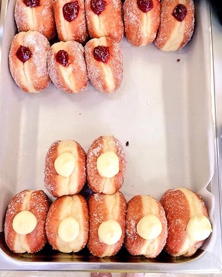 Some rather spectacular donuts at Bread Ahead in Old Street, London. When it was a choice between cold pizza or one of these for breakfast on Saturday, I chose the custard donut.