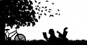 Girl-Reading-Book-Outside-973x508