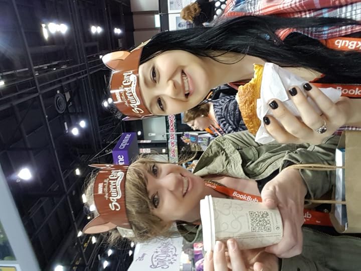 Daphne and Sami-Jo enjoy the wonders of sustenance and wearable swag