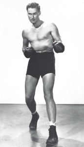 Flynn in the 1937 star vehicle The Perfect Specimen, which included a boxing scene.