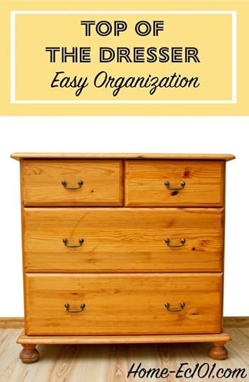 As with most horizontal surfaces, dressers tend to become a catch-all. Your easy organization challenge is to clear off the dresser.