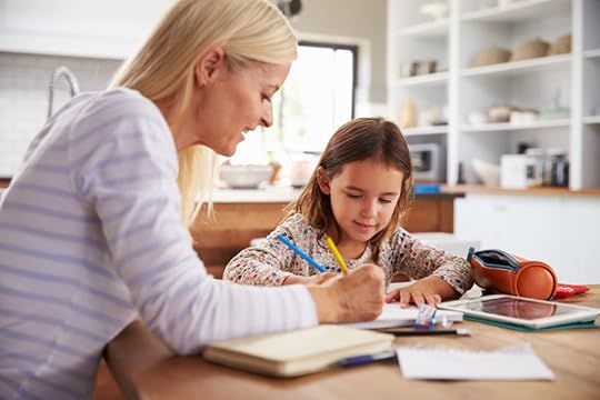 41392634 - mother teaching her daughter at home
