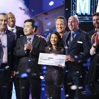 Team Grush Brush celebrate winning America's Greatest Makers. Front row (from left) Brian Krzanich Intel CEO and show judge; Yongjing Wang, Team Grush; Dr. Anubha Sacheti, Team Grush; Ethan Schur, Team Grush; Carol Roth, show judge. Back row (from left) Kenny Smith, guest judge; Mike Rowe, guest judge; Jonathan Schaffer, Team ASEAH. (Credit: Tommy Baynard/Intel Corporation)
