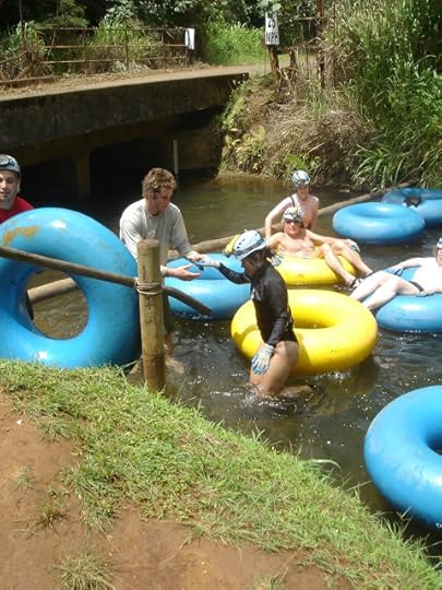 exiting the water on the Kauai Backcountry Tubing Adventure