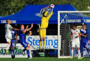 FC Edmonton keeper Matt VanOekel makes a catch.