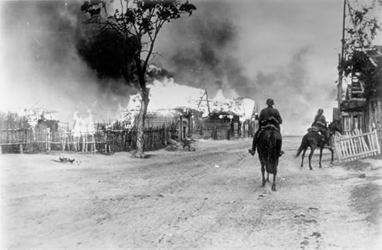 German cavalry in village near Mogilev, Byelorussia, 28 July 1941. (German Federal Archive: Bild 101I-137-1032-14A)