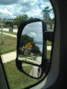 dead end sign in the rear view mirror