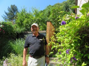 Herr Unger shows where his parents had a garden in the house where he grew up.