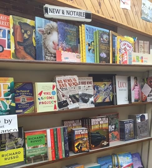 I would have cropped this closer, but man...there's my books and down in the corner there? My hero Richard Russo. Yup. Almost on the same shelf at The Children's Book Cellar in Waterville. Don't worry. I AM humbled.