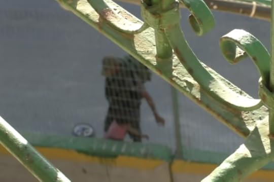 An Israeli occupation police officer stealing the bike of an 8-year-old Palestinian girl in the occupied West Bank