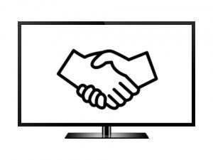 two hands shaking in a monitor screeen