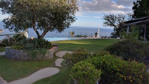 The villa grounds, with infinity pool. Photo by j a-b