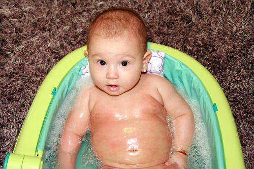 Baby in bathtub.