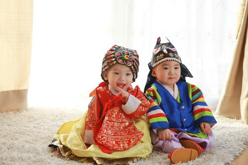 Babies, Asian dress.