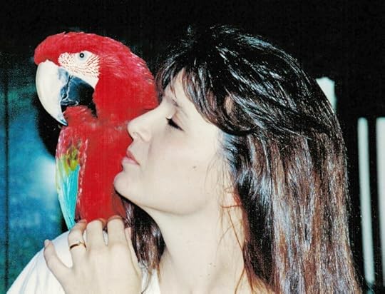 Ceejae Divine and Rocket the macaw