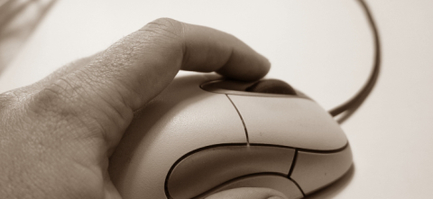 image of a left hand using a mouse for International Lefties Day