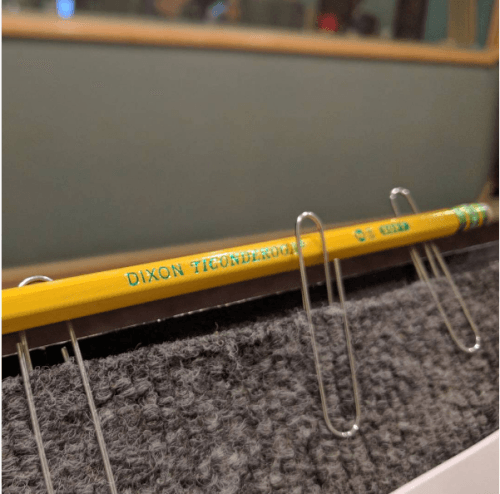 Pencil, with paperclips. From the Pretentious Bullshit collection.