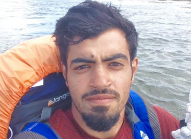 Ammar Albadi and his backpack that have traveled around the country. 