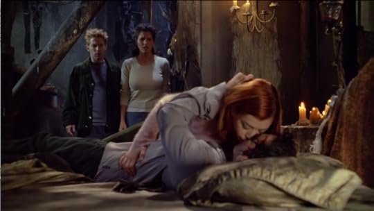 Willow is like, on top of Xander, they're kissing, and Oz and Cordelia are standing there looking hurt and horrified.