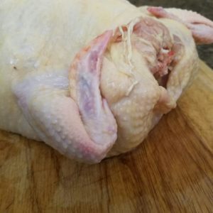 Twist the chicken wings back on themselves