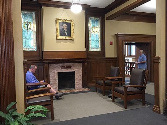 The front desk area in the old section is now a comfortable reading nook. The one thing that hasn't change is old Mr. Lithgow keeping an eye on things from above.