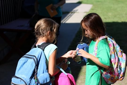 SteelyKid in negotiations with her BFF about who gets which lollipop flavors.