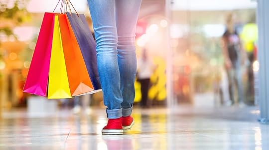 30498633 - shopping time, closeup of teenage girl legs with shopping bags at shopping mall