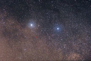 The two bright stars are (left) α Centauri and (right) β Centauri. The faint red star in the center of the red circle is Proxima Centauri. - the planet has been detected using spectrographs