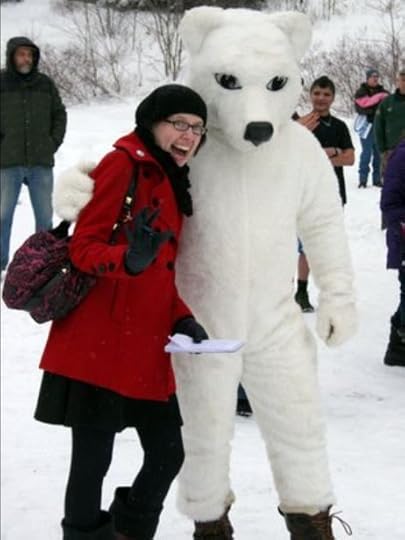 Libby Cudmore as a reporter. interviewing Goody The Polar Bear at the annual Goodyear Lake Polar Bear Jump