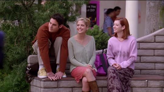 Xander, Buffy, and Willow sit in the place they'd earlier disappeared from. They're smiling and laughing.